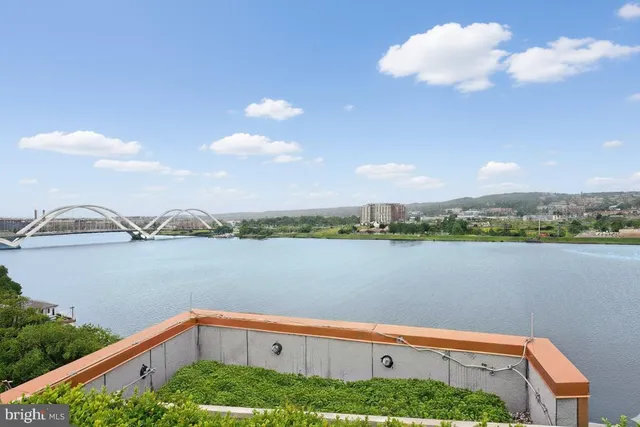 a view of lake with green space