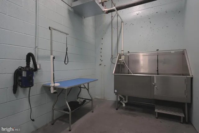 a room with a table and chairs