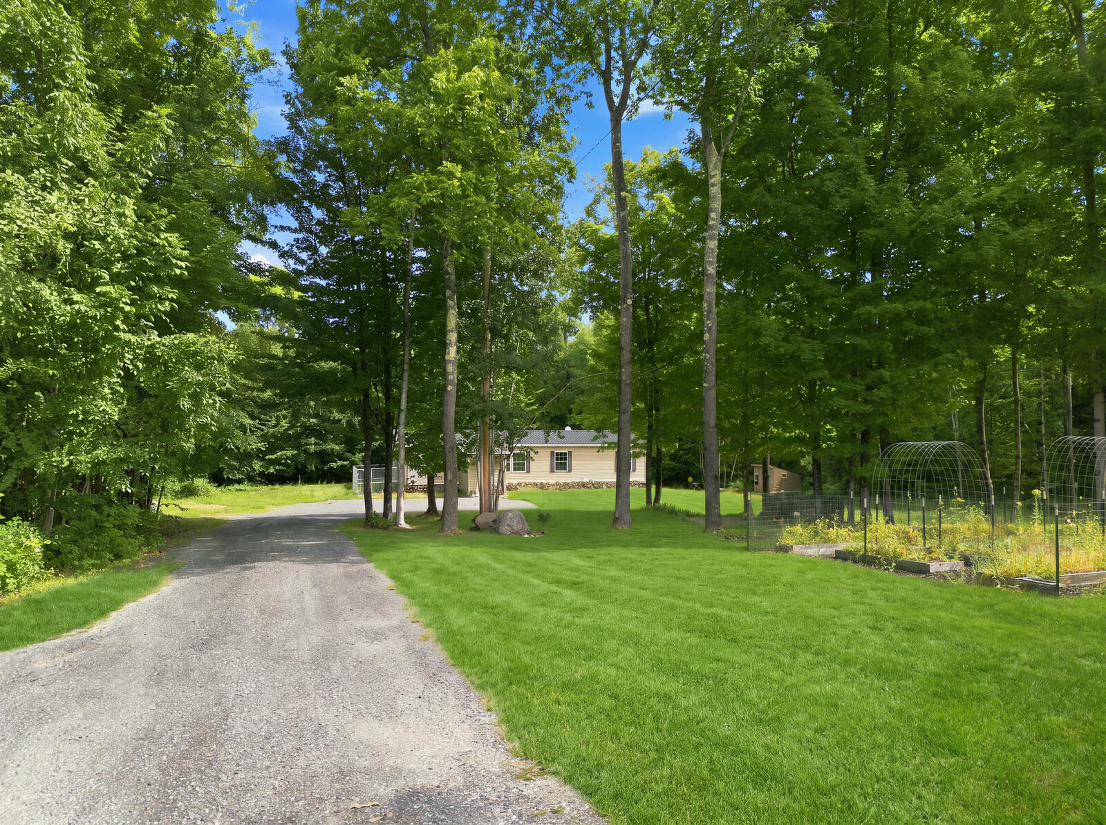 336 Mile Hill Road New Sharon, ME 04955 - Photo 3 of 37 front driveway