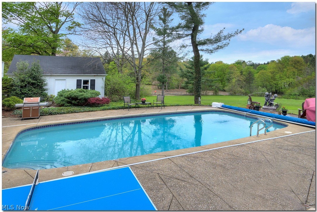 33955 Old Kinsman Road Hunting Valley, OH 44022 - Photo 34 of 35 Enjoy the long vistas of greenery from the pool patio.