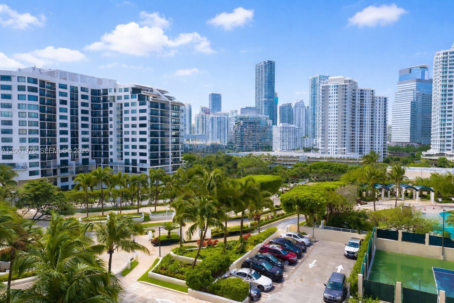 848 Brickell Key Drive, Unit 905 Miami, FL 33131 - Photo 23 of 28 a view of a city with tall buildings