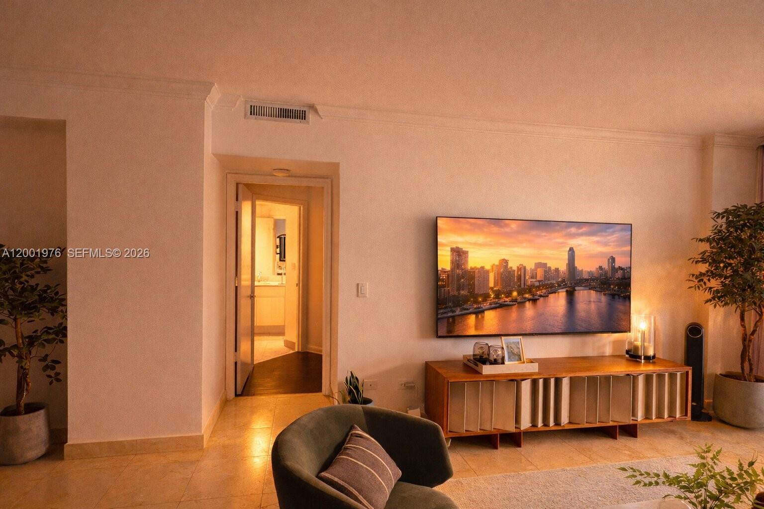 848 Brickell Key Drive, Unit 905 Miami, FL 33131 - Photo 4 of 28 a bedroom with furniture and a window