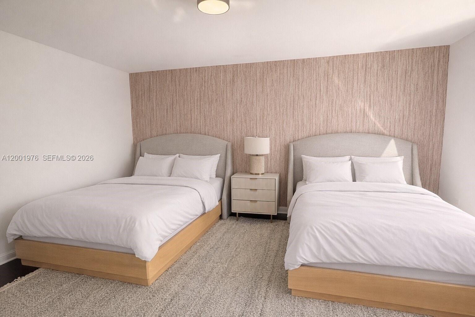 848 Brickell Key Drive, Unit 905 Miami, FL 33131 - Photo 9 of 28 a bedroom with a bed and a night stand