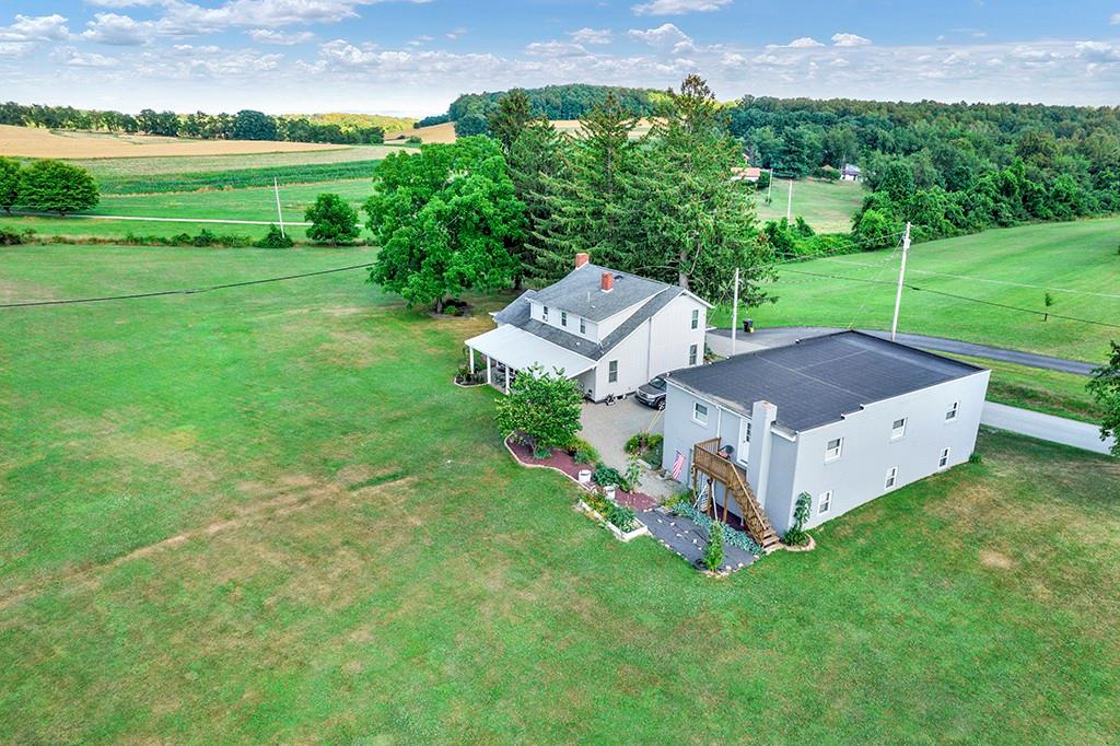 42 Maplewood Road Vanderbilt, PA 15486 - Photo 1 of 25 a aerial view of a house with a yard