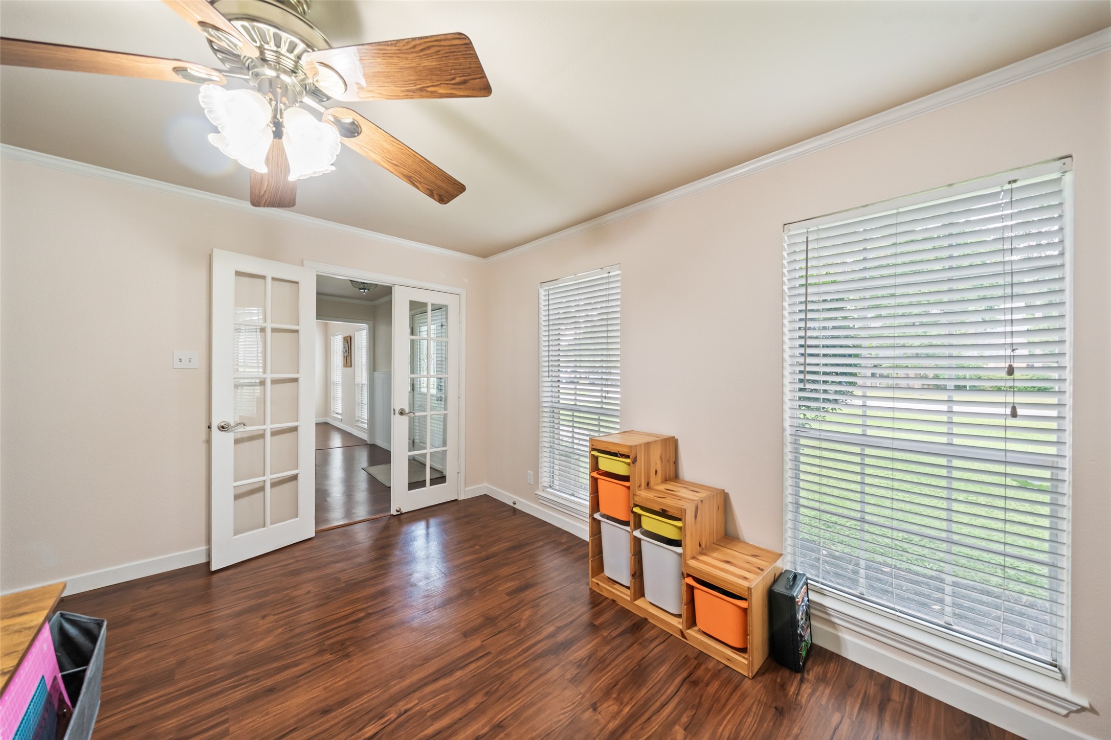 600 Hampton Hall Lane Conroe, TX 77302 - Photo 17 of 32 a view of a livingroom with furniture and wooden floor