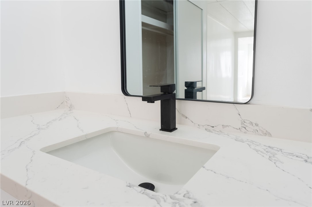 4980 Ridge Drive Las Vegas, NV 89103 - Photo 19 of 36 Bathroom view of vanity