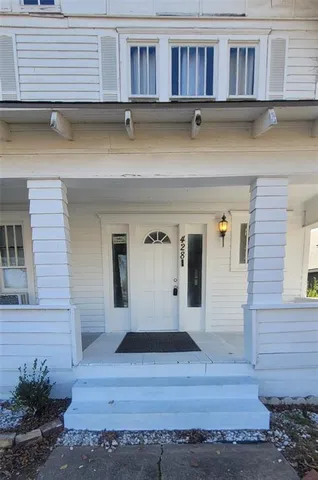 a view of kitchen with wooden floor