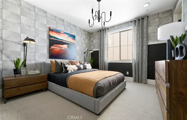 a bedroom with a bed dresser and window