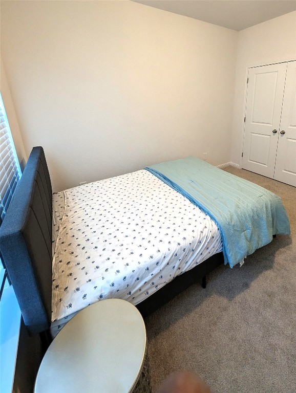 441 El Capitan Loop Dripping Springs, TX 78620 - Photo 25 of 26 a bedroom with a bed and a window