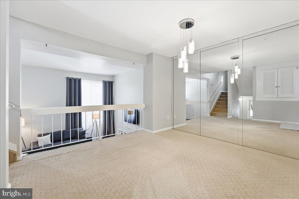 159 Henderson Place Hightstown, NJ 08520 - Photo 14 of 32 a view of empty room with a fireplace