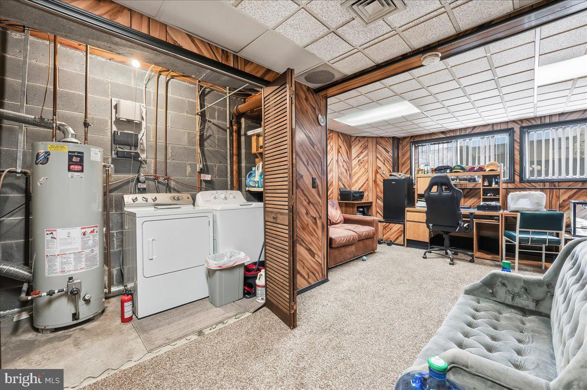 159 Henderson Place Hightstown, NJ 08520 - Photo 30 of 32 a view of living room filled with furniture and white walls