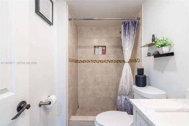 a view of workspace with wooden floor and windows