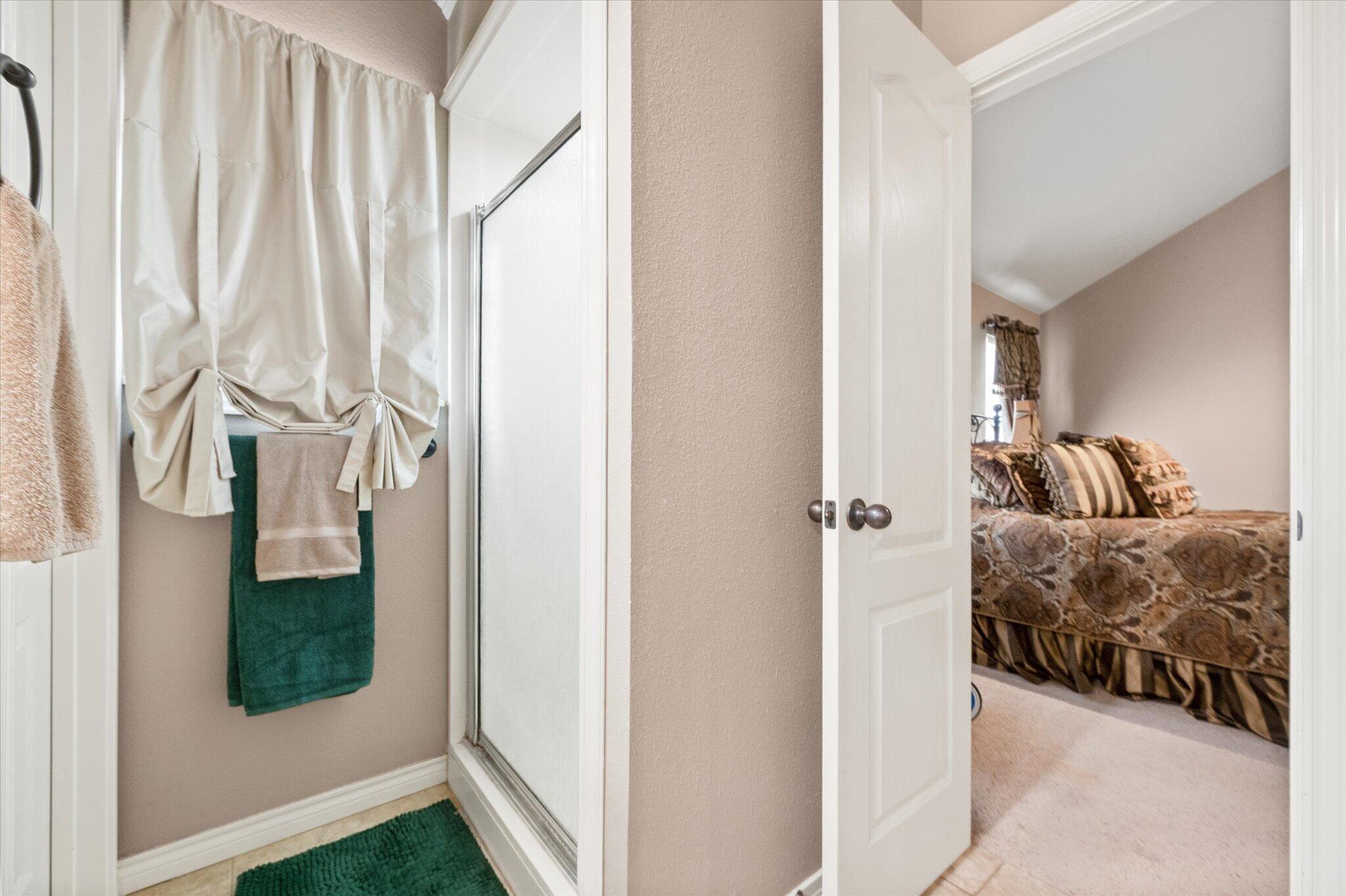 5838 101st Street Lubbock, TX 79424 - Photo 36 of 37 a bedroom with a bed and a window