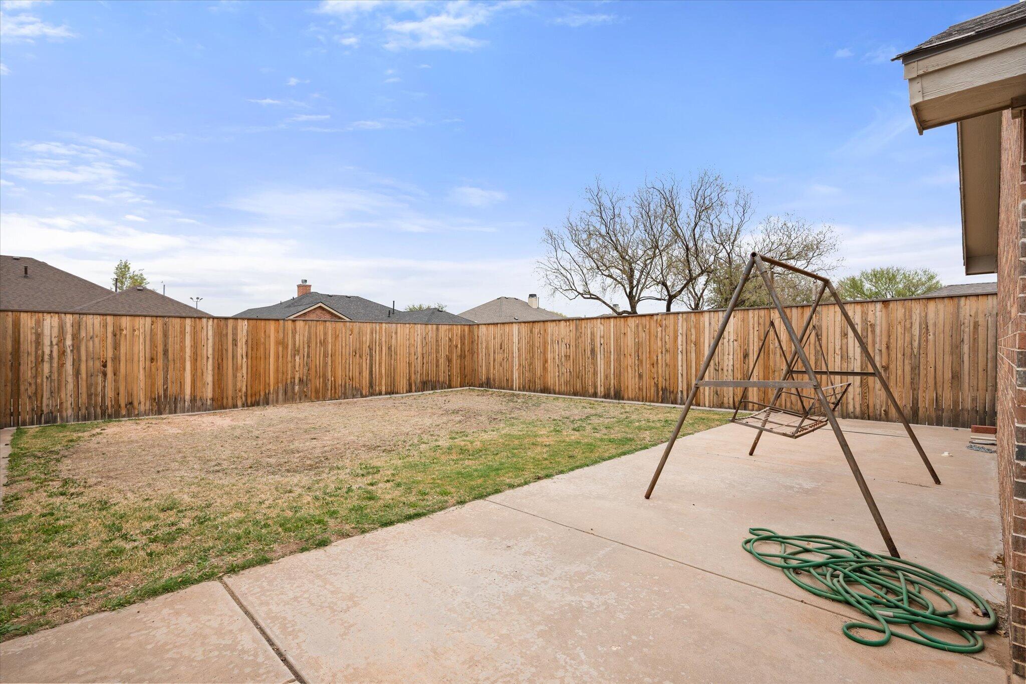 5838 101st Street Lubbock, TX 79424 - Photo 37 of 37 a backyard of a house