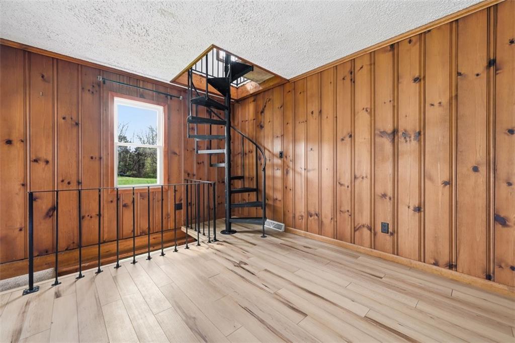 192 Yellow Creek Road Harmony, PA 16037 - Photo 14 of 41 a view of a house with wooden floor and wooden fence