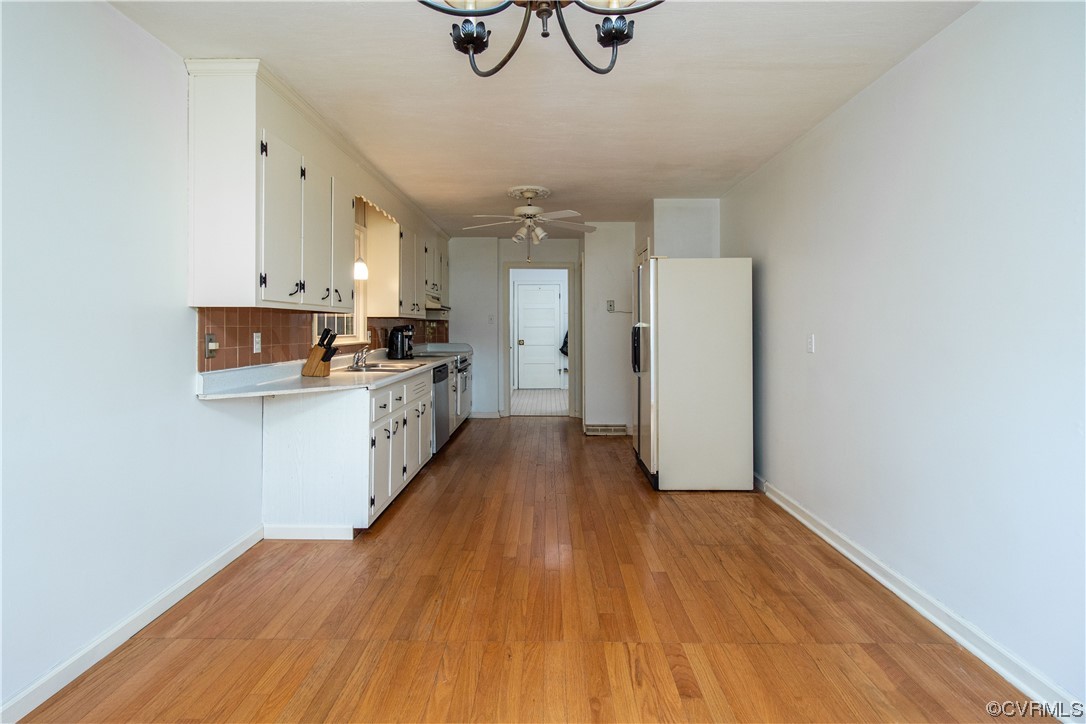 1305 Covington Road Colonial Heights, VA 23834 - Photo 14 of 34 a view of a kitchen with wooden floor