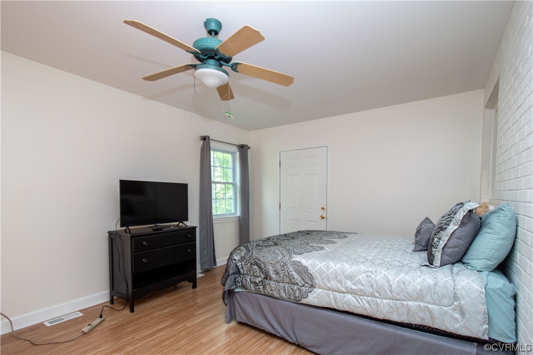 1305 Covington Road Colonial Heights, VA 23834 - Photo 18 of 34 a bedroom with a bed and a flat screen tv