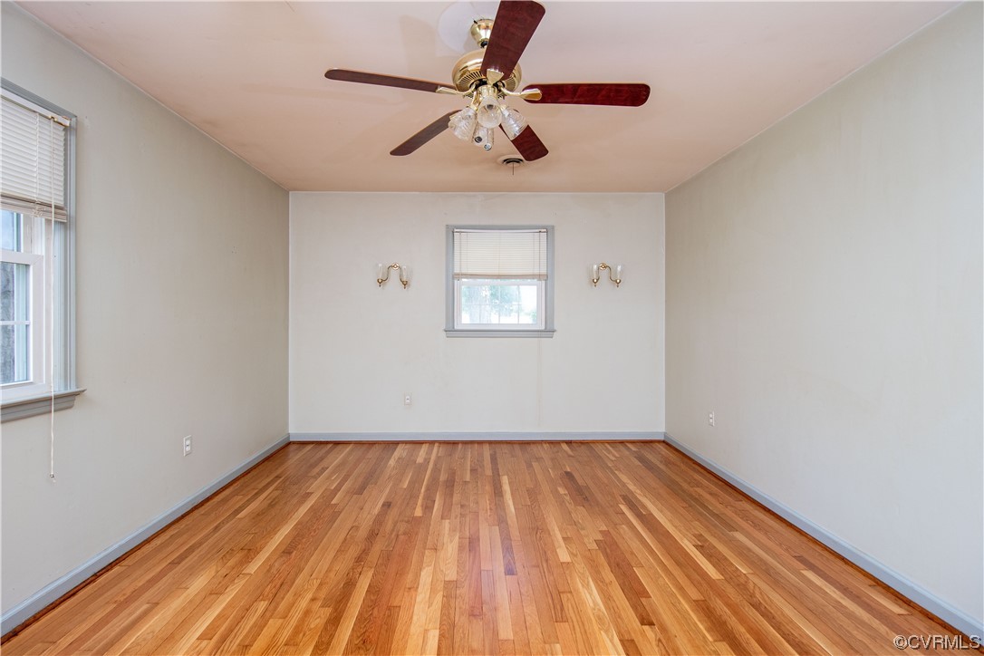 1305 Covington Road Colonial Heights, VA 23834 - Photo 24 of 34 a view of empty room with wooden floor and fan