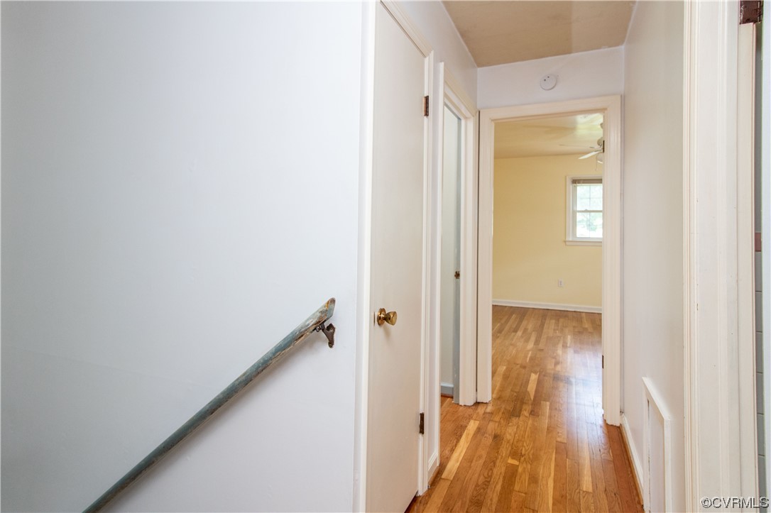 1305 Covington Road Colonial Heights, VA 23834 - Photo 27 of 34 a view of a hallway with wooden floor and staircase