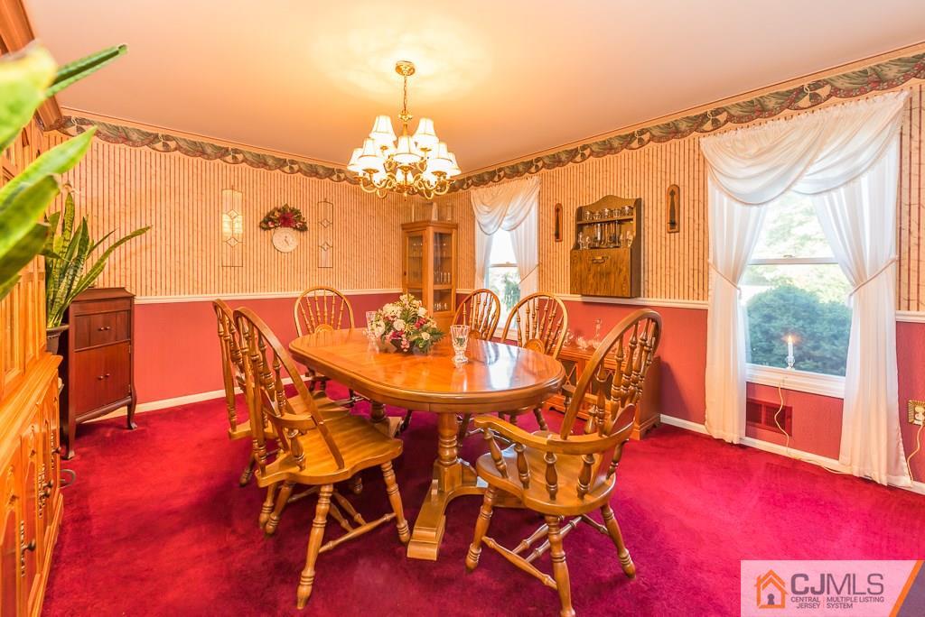 14 Crest Road Jackson, NJ 08527 - Photo 8 of 24 a view of a dining room with furniture window and outside view