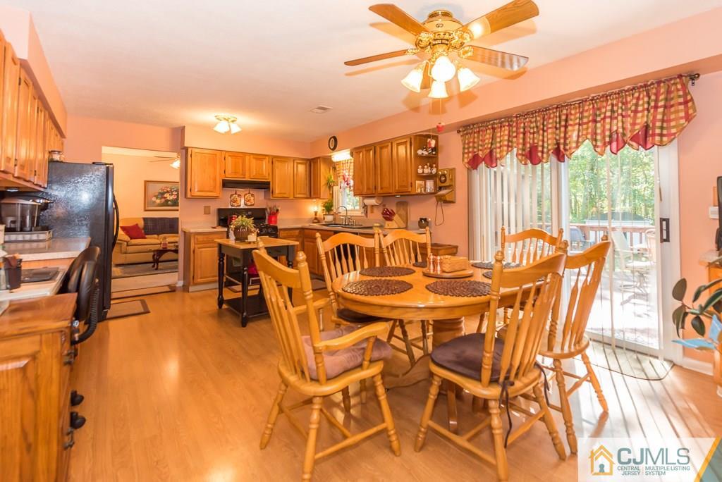 14 Crest Road Jackson, NJ 08527 - Photo 9 of 24 a view of a dining room with furniture window and outside view
