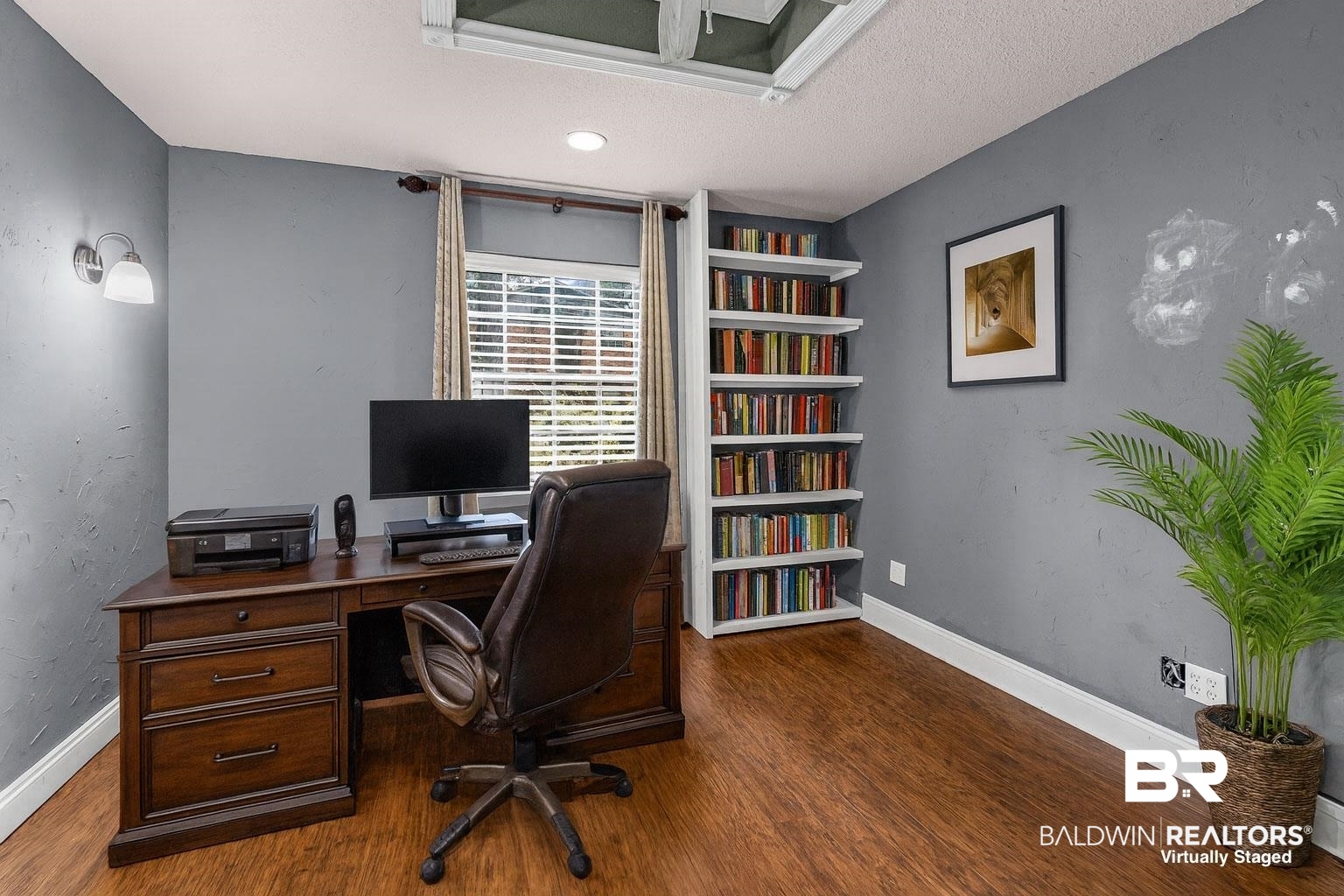 36 Ridgeview Drive Mobile, AL 36611 - Photo 17 of 20 Virtually staged room with dark wood finished floors and a textured ceiling that can function as an office or spare room