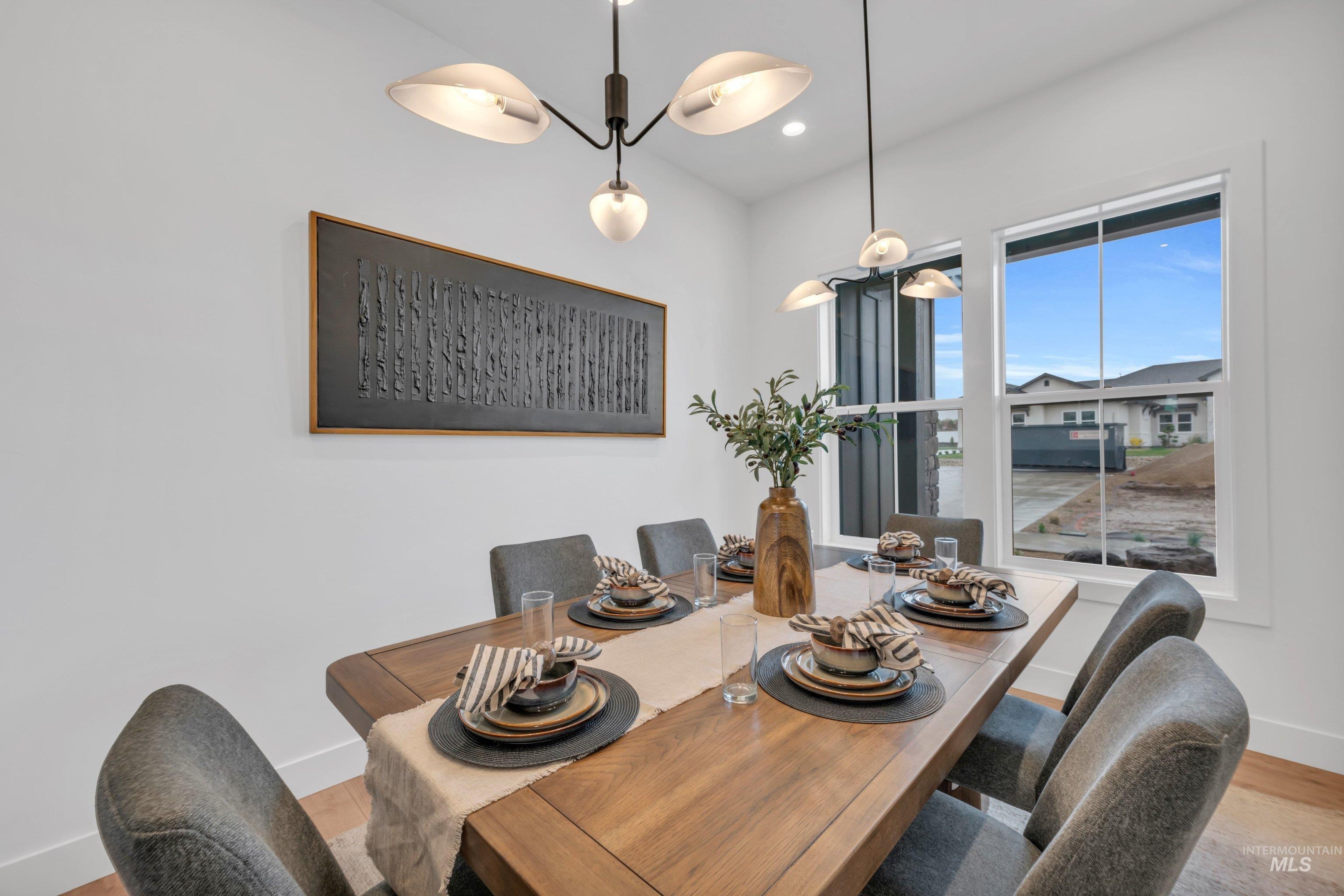 24871 Ardmore Court Caldwell, ID 83607 - Photo 19 of 44 Dining space with light wood finished floors and recessed lighting