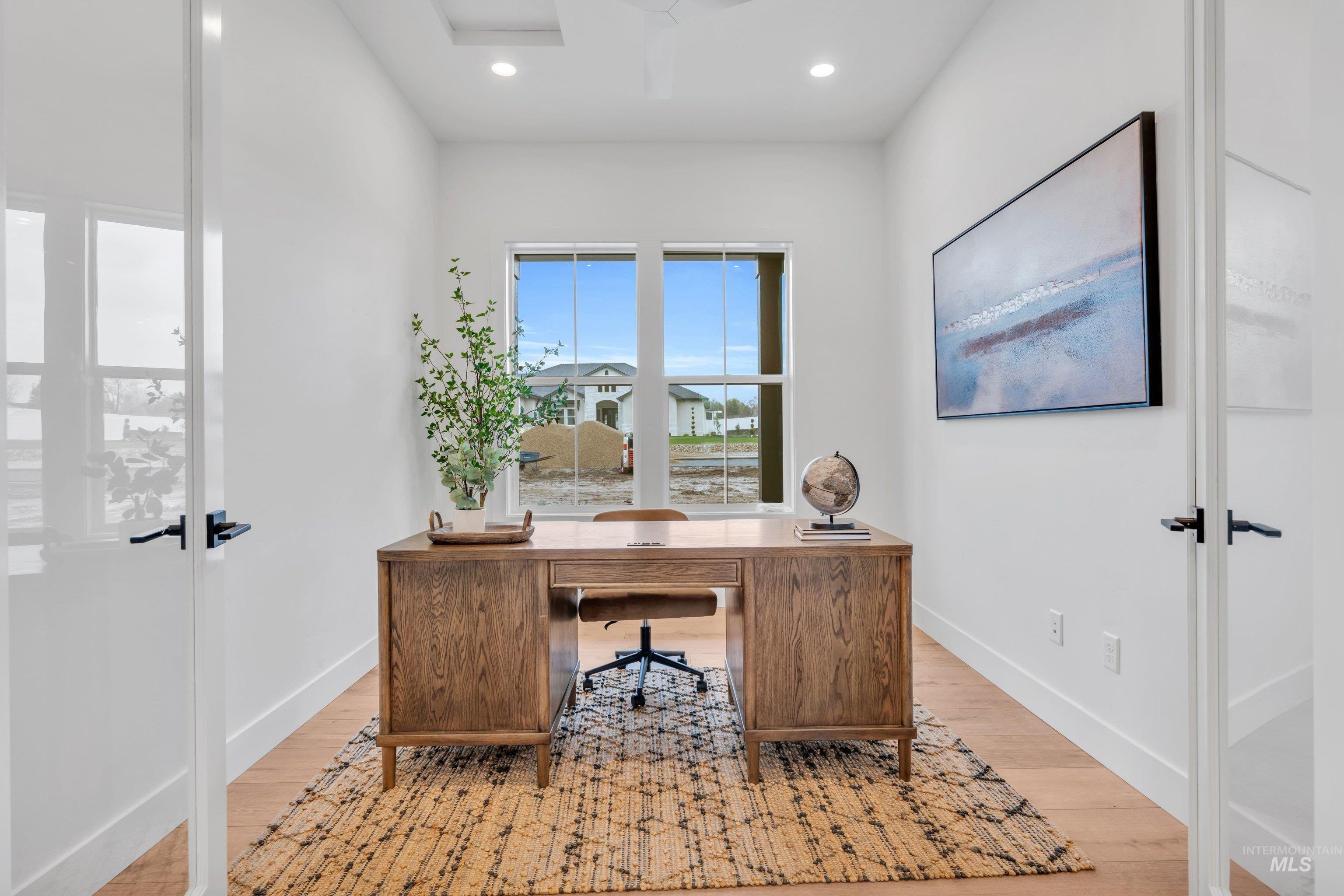 24871 Ardmore Court Caldwell, ID 83607 - Photo 22 of 44 Office space with light wood finished floors, french doors, and recessed lighting
