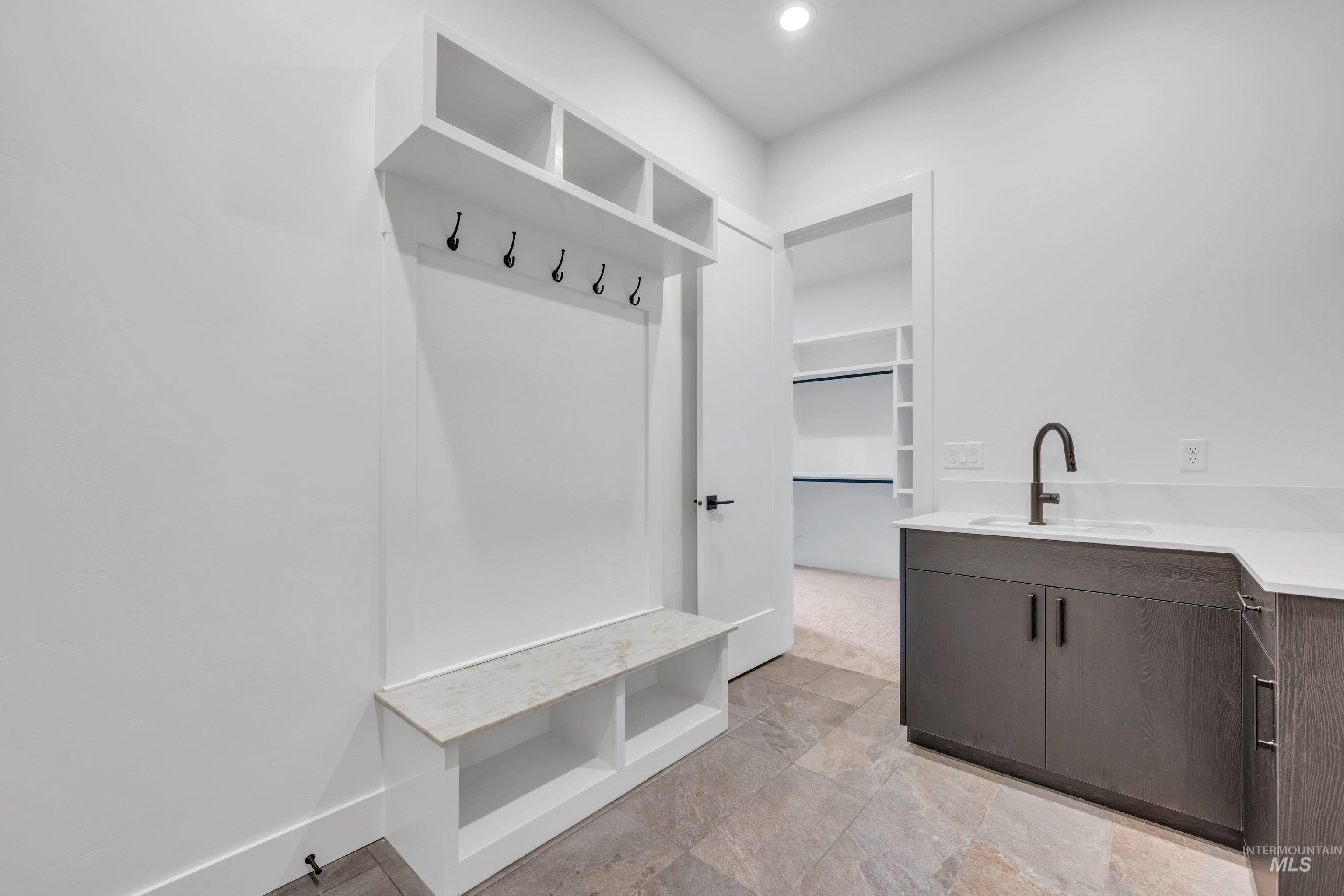 24871 Ardmore Court Caldwell, ID 83607 - Photo 28 of 44 Mudroom featuring a sink and recessed lighting