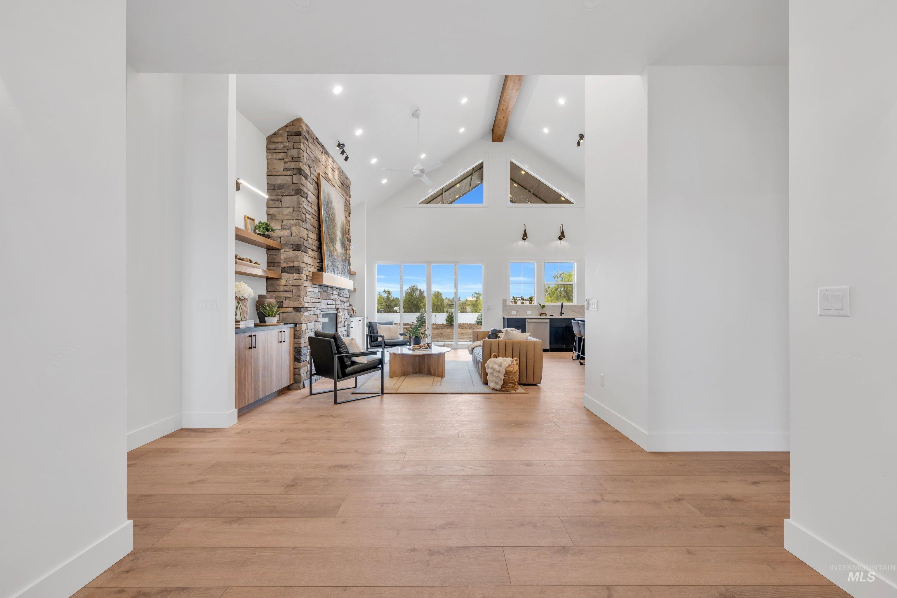 24871 Ardmore Court Caldwell, ID 83607 - Photo 4 of 44 Hall featuring light wood-style floors and baseboards