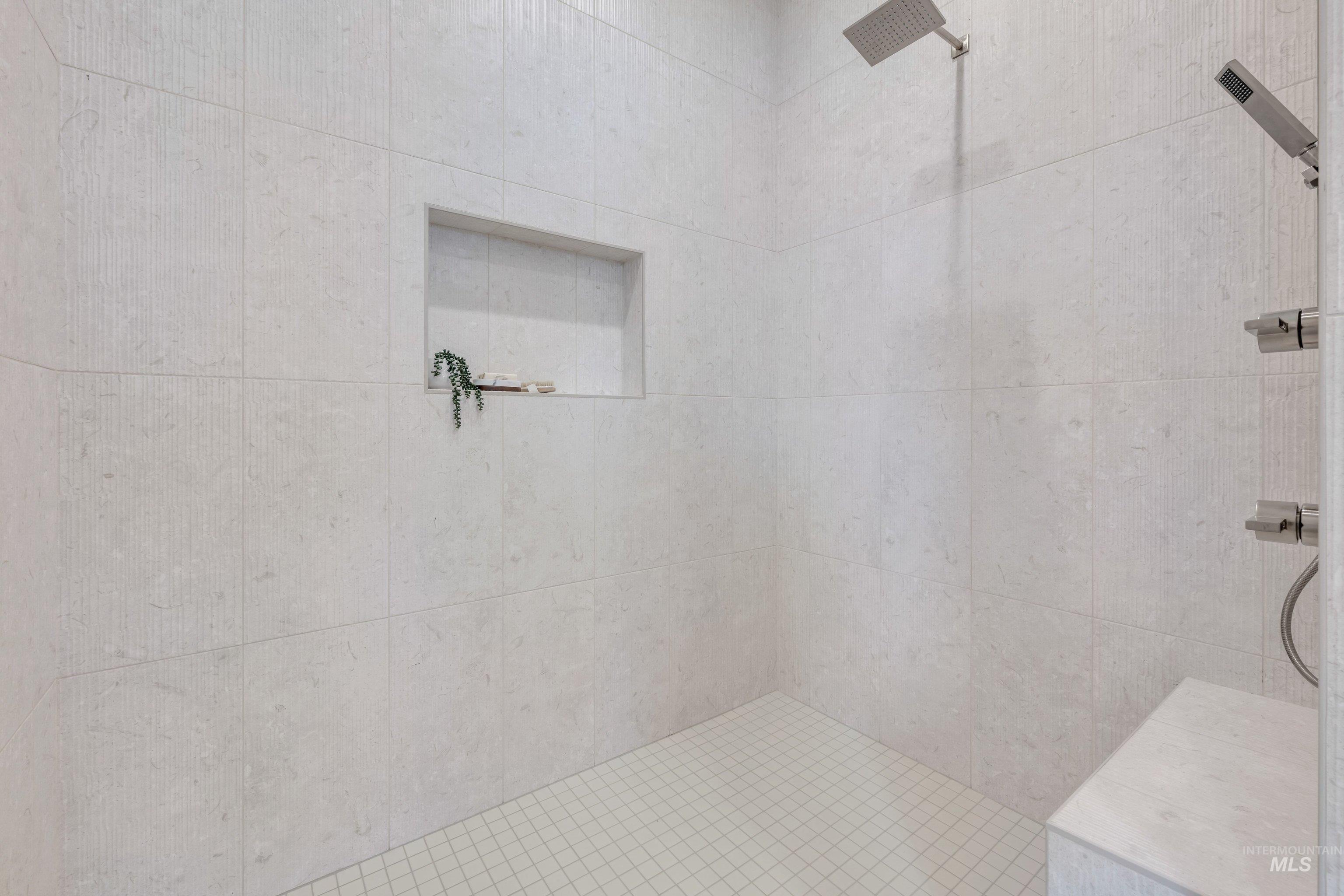 24871 Ardmore Court Caldwell, ID 83607 - Photo 41 of 44 Bathroom featuring a tile shower
