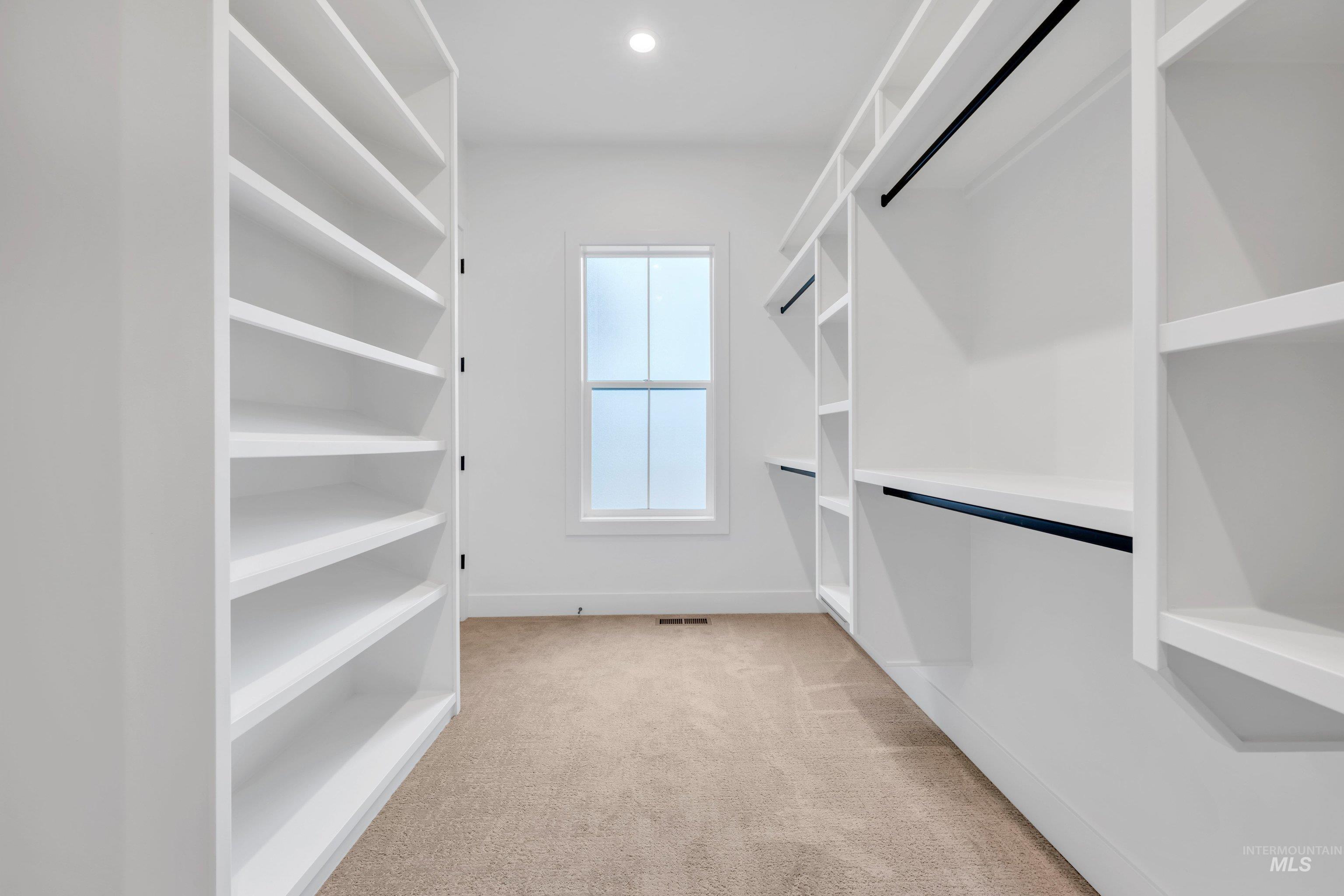 24871 Ardmore Court Caldwell, ID 83607 - Photo 42 of 44 Walk in closet with light colored carpet