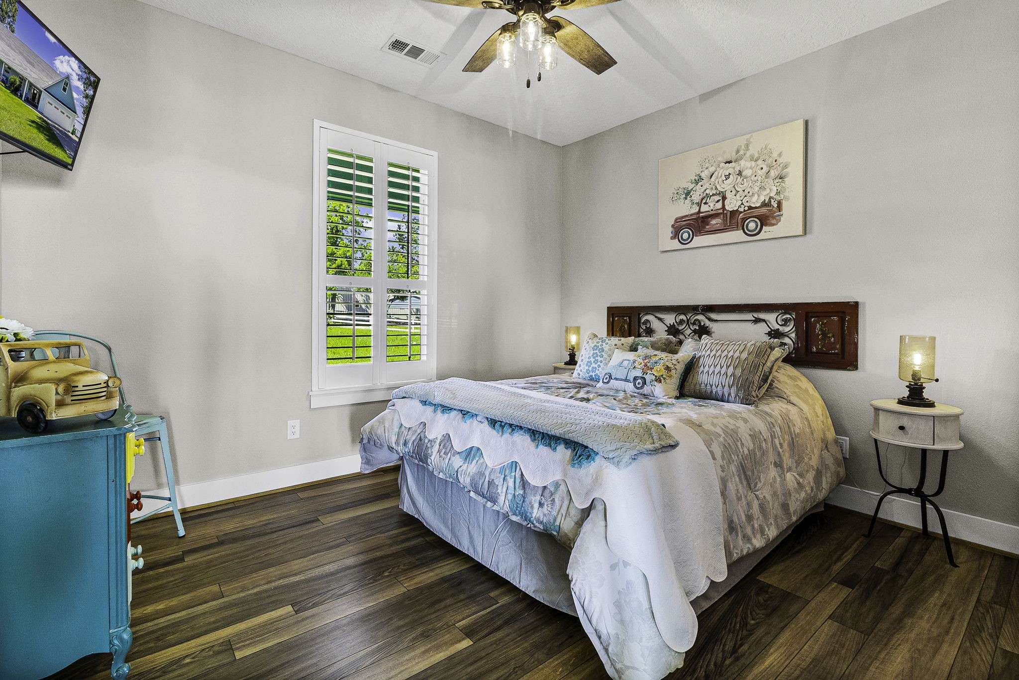 151 Key Largo Loop Point Blank, TX 77364 - Photo 27 of 49 Bright and airy bedroom offering plantation shutters, high ceilings, and timeless finishes.