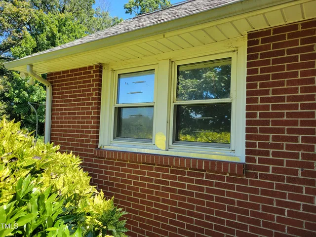 a view of a garden with an outdoor space