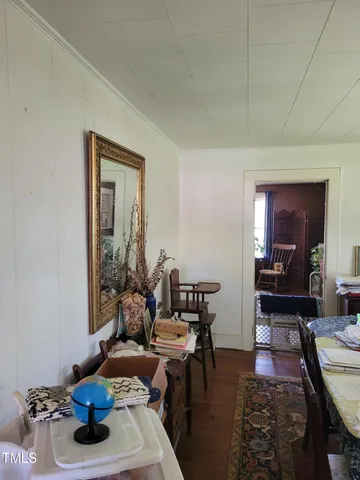 a view of a swimming pool with a yard