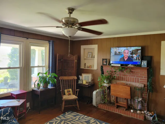 a view of a swimming pool with an outdoor space and seating area