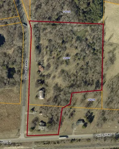 a view of a swimming pool with an outdoor space and seating area