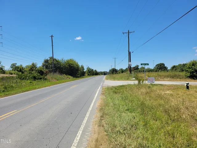 a view of a park with welcome board