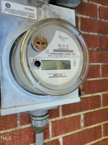 a view of a brick house with a large window