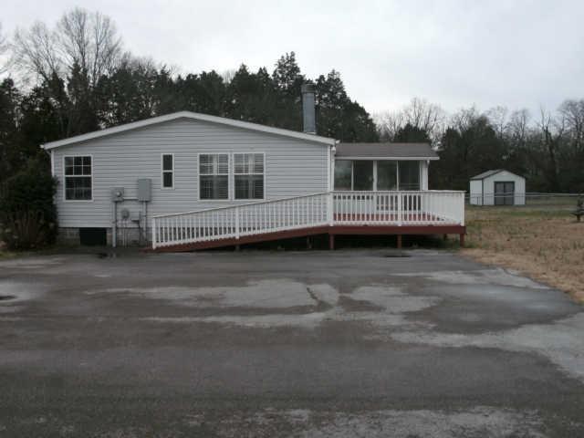 1791 Old Rome Pike Lebanon, TN 37087 - Photo 11 of 15 Side view of home. Notice the large paved parking area and handicaped ramp.