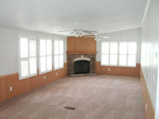 1791 Old Rome Pike Lebanon, TN 37087 - Photo 4 of 15 Den w/plantation shutter and corner fireplace w/logs.