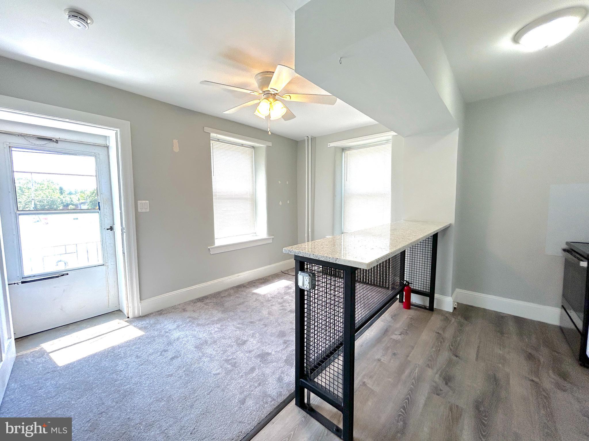 15 Level Road, Unit 5 Collegeville, PA 19426 - Photo 5 of 10 an empty room with windows and fan