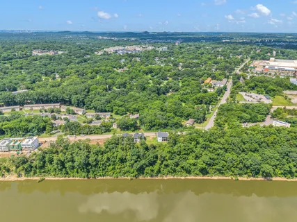 a view of a lake with a city