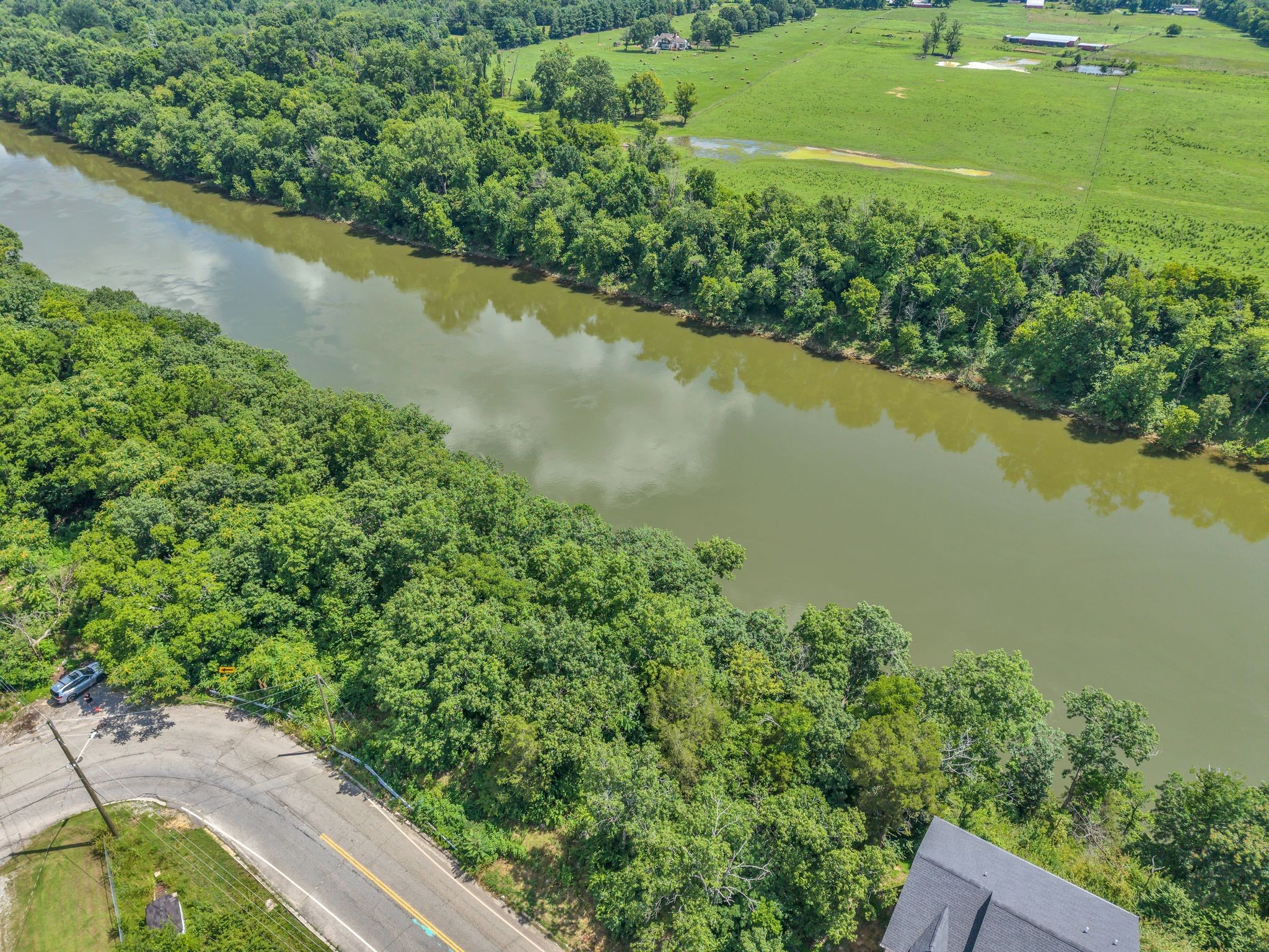 392 Rio Vista Drive Madison, TN 37115 - Photo 8 of 22 a view of a lake with a yard