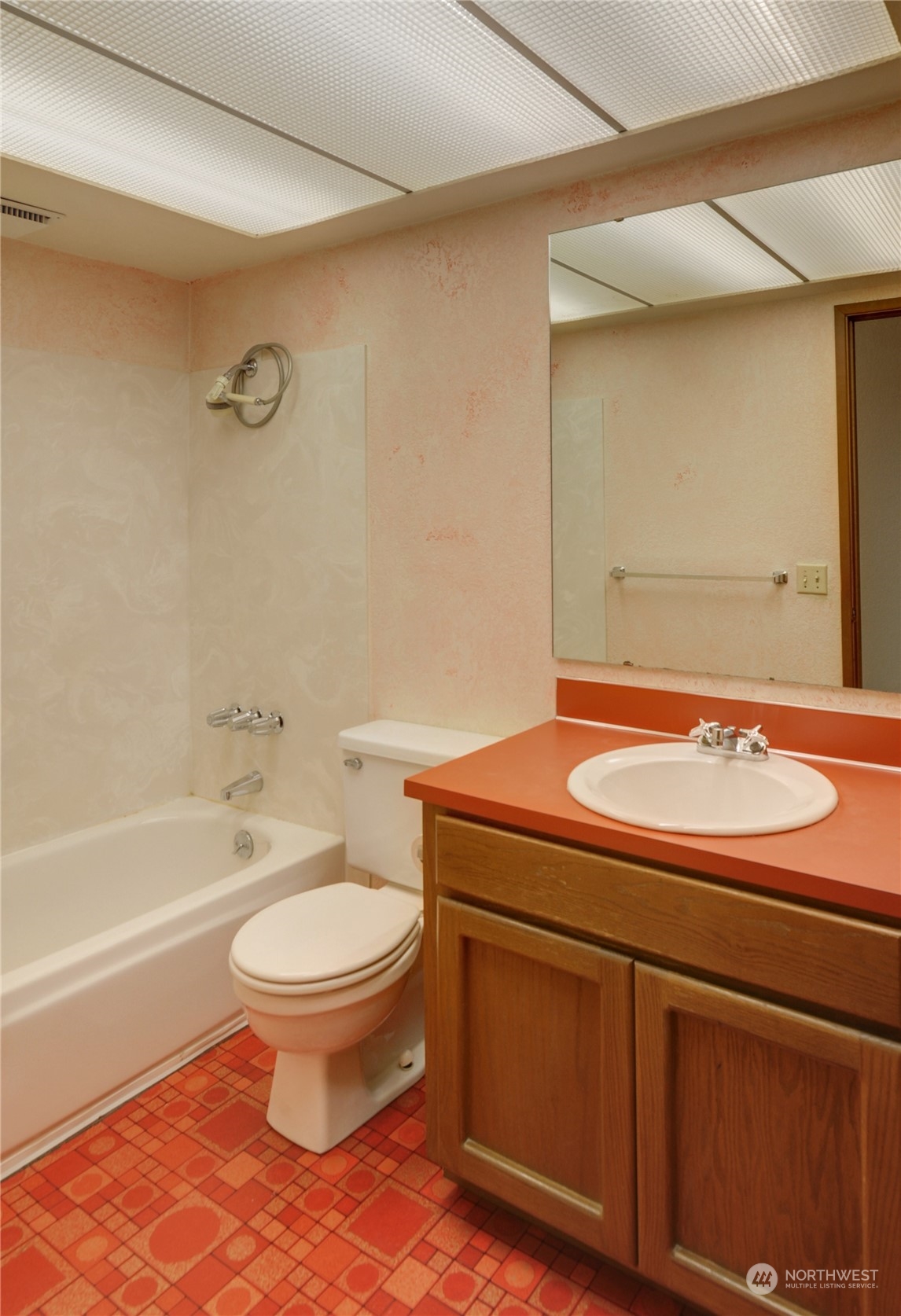 717 Daley Street Edmonds, WA 98020 - Photo 22 of 40 a bathroom with a sink and a mirror