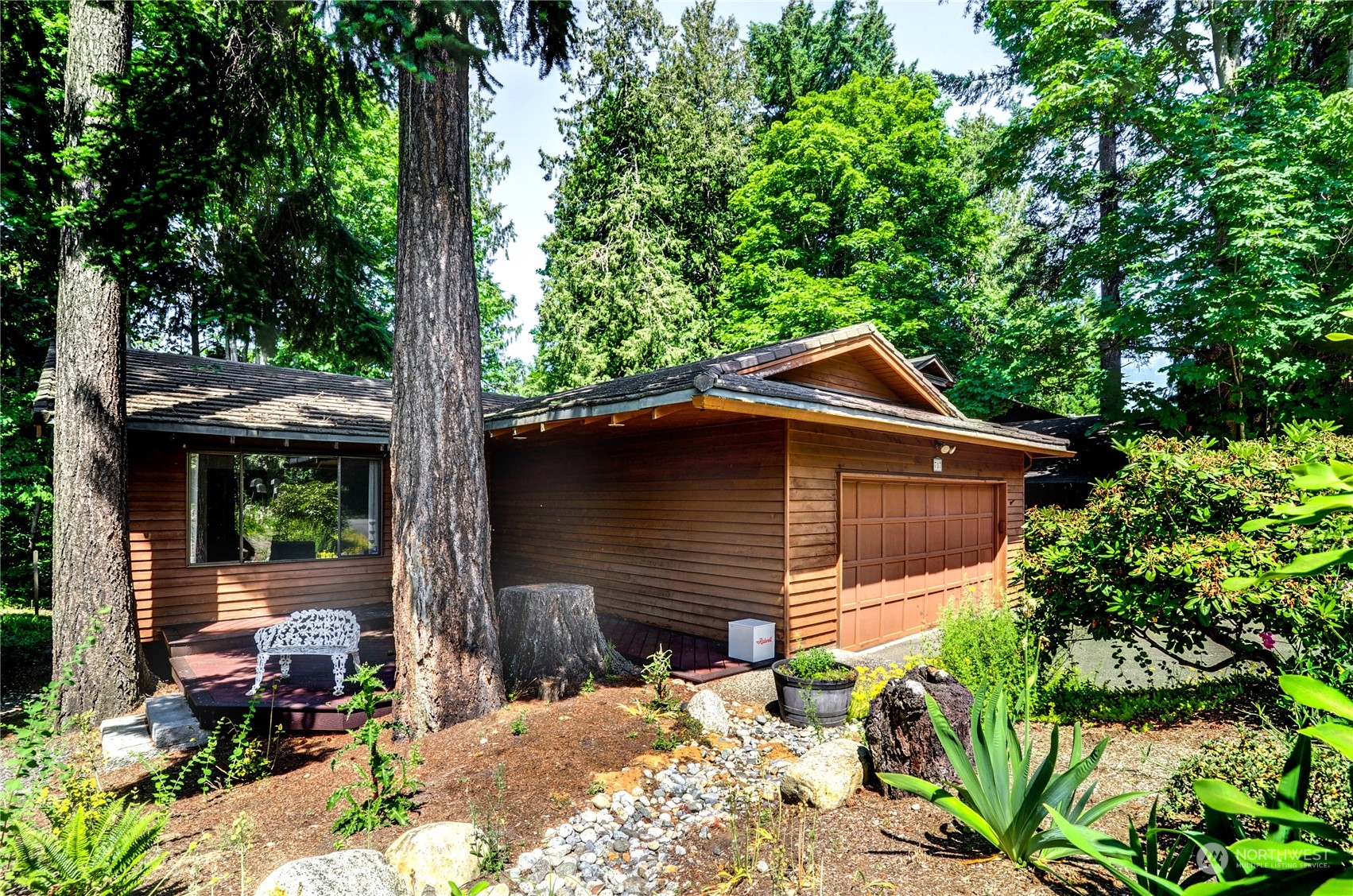 717 Daley Street Edmonds, WA 98020 - Photo 3 of 40 a backyard of a house with seating space