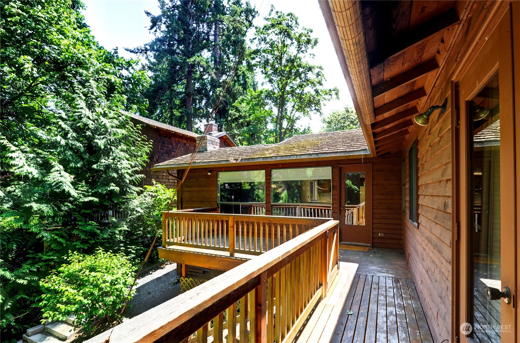 717 Daley Street Edmonds, WA 98020 - Photo 31 of 40 a view of balcony with deck and wooden floor