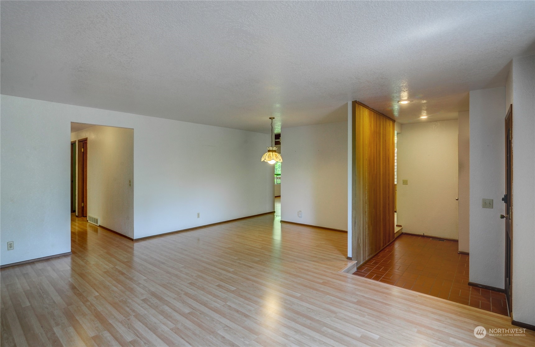 717 Daley Street Edmonds, WA 98020 - Photo 5 of 40 a view of empty room with wooden floor