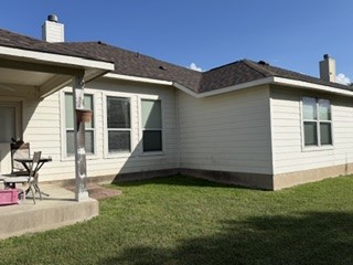 6720 Cromarty Lane Austin, TX 78754 - Photo 10 of 24 A private yard with a covered patio offers outdoor relaxation.