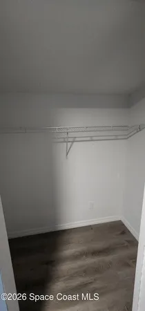 a view of small space with racks on the wall